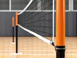 Volleyball net and posts setup on a court
